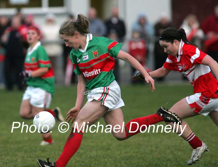Claire Egan, Carnacon chased Catriona McConnell Donaghmoyne in the Vhi Healthcare All-Ireland Ladies Senior Club Championship Final, Carnacon v Donaghmoyne, Pairc Na nGael, Dromard, Co Longford. Photo:  Michael Donnelly