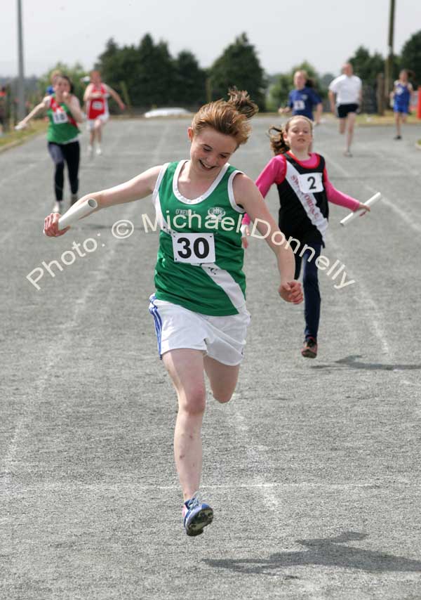 A delighted Claire O'Brien Castlebar crosses the line in the Girls U-14 Relay race at the Mayo finals of the HSE Community Games in Claremorris. Photo:  Michael Donnelly
