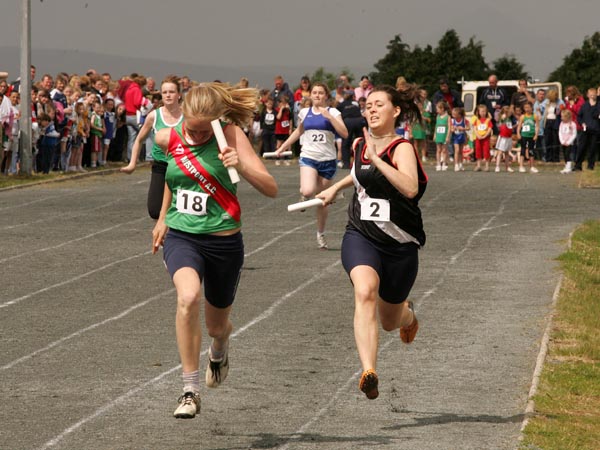 Caoimhe King Westport wins and Tara Henry comes in 2nd in the Girls U-16 Relay at the Mayo finals of the HSE Community Games in Claremorris. Photo:  Michael Donnelly
