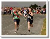 Caoimhe King Westport wins and Tara Henry comes in 2nd in the Girls U-16 Relay at the Mayo finals of the HSE Community Games in Claremorris. Photo:  Michael Donnelly