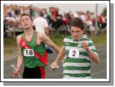 Chris Reddington, Swinford beats Caoimhin McGreal, Westport in the final leg of the Boys U-16 Relay at the Mayo finals of the HSE Community Games in Claremorris. Photo:  Michael Donnelly