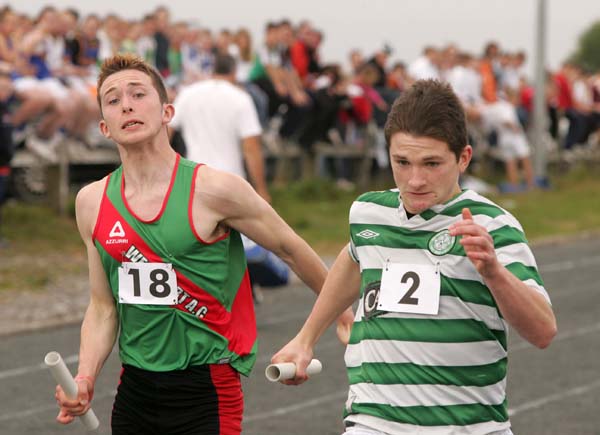 Chris Reddington, Swinford beats Caoimhin McGreal, Westport in the final leg of the Boys U-16 Relay at the Mayo finals of the HSE Community Games in Claremorris. Photo:  Michael Donnelly