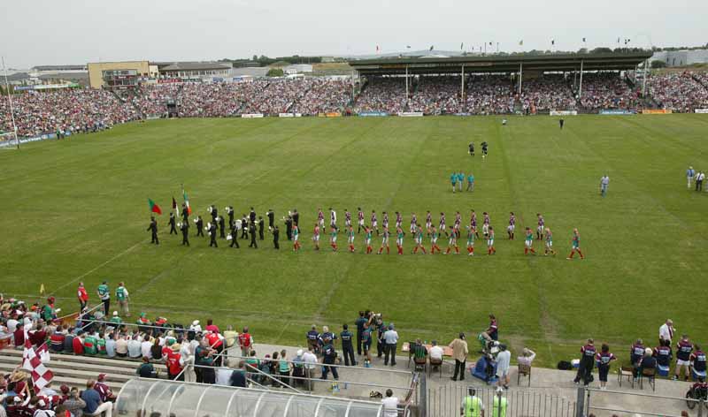 Mayo and Galway teams line out behind the Castlebar Concert Band in the Bank of Ireland Connacht Senior Football Championship in McHale Park Castlebar