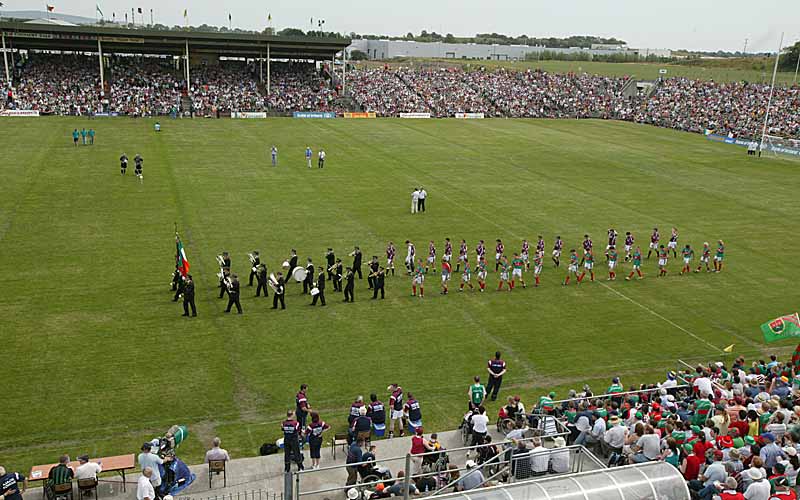 Mayo and Galway teams line out behind the Castlebar Concert Band in the Bank of Ireland Connacht Senior Football Championship in McHale Park Castlebar