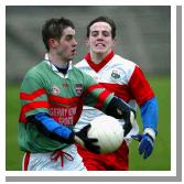 Ballina Stephenites Corner back Michael McHale is closed watched by Aughamore's Kevin Nolan in the Breaffy House and Spa  County Junior Football Championship Final in McHale Park Castlebar. Photo: Michael Donnelly