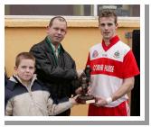 Conor and Mark Deegan (Chef Breaffy House Hotel) presents the Man of the Match award to David Kilkenny Aughamore  in the Breaffy House and Spa  County Junior  Football Final in McHale Park Castlebar. Photo: Michael Donnelly