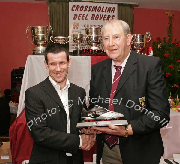 Cathal Prior, chairman Crossmolina Deel Rovers (on right) presents the Senior Player of the Year award to Joe Keane at the Crossmolina Deel Rovers Dinner Dance in Hiney's Upper Deck, Crossmolina. Photo:  Michael Donnelly