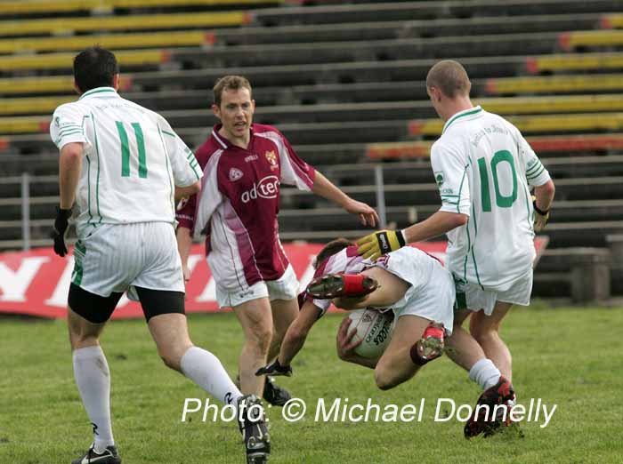 Declan Keating  Crossmolina holds on to this ball despite his posture in the Lynch Breaffy House Hotel and Spa County Senior Football Final replay in McHale Park Castlebar. Photo:  Michael Donnelly