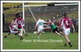 Ballaghaderreen's Andy Hanley sends this ball to the back of the Crossmolina net in the Lynch Breaffy House Hotel and Spa County Senior Football Final Replay in McHale Park Castlebar. Photo:  Michael Donnelly