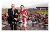 James Waldron, Chairman Mayo GAA County Board presents the Moclair Cup to Peadar Gardiner, captain of Crossmolina Deel Rovers after they defeated Ballaghaderreen in the Lynch Breaffy House Hotel and Spa County Senior Football final replay in McHale Park, Castlebar. Photo:  Michael Donnelly