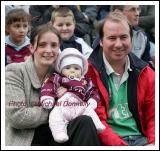 5 month old Michaela Mullaney Crossmolina pictured with her parents Aisling and Keith, was probably the youngest supporter in McHale Park Castlebar at the Lynch Breaffy House Hotel and Spa County Senior Football Final Replay between Crossmolina and Ballagaderreen. Photo:  Michael Donnelly