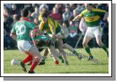 Billy Joe Padden comes under pressure in the 1st round of the Allianz National Football League between Mayo and Kerry, at McHale Park last Sunday. Photo:  Michael Donnelly