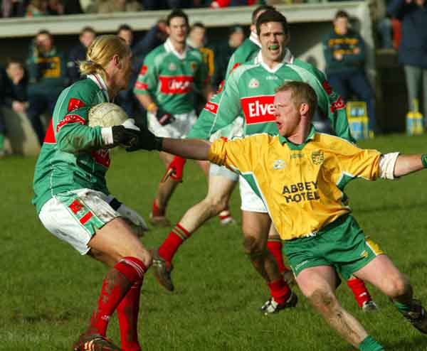 Ciaran McDonald slips by Donegal's Brian Roper in the Allianz National Football League Div 1A in James Stephens Park Ballina.
Photo: Michael Donnelly