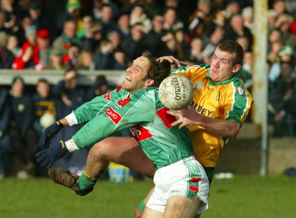 Billy Joe Padden Mayo and Neil Gallagher in close contact  in the Allianz National Football League Div 1A in James Stephens Park Ballina.
Photo: Michael Donnelly 
