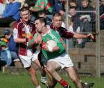 Alan Roche has close company at McHale Park at Allianz National Football League Div 1A Round 7 featuring Westmeath v Mayo. Photo Michael Donnelly