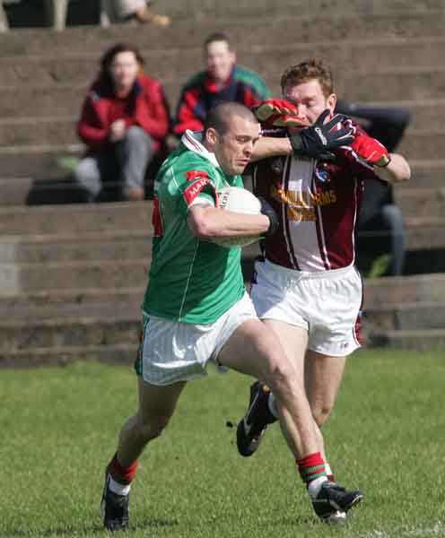 Trevor Mortimer fights off his marker at McHale Park at Allianz National Football League Div 1A Round 7 featuring Westmeath v Mayo. Photo Michael Donnelly