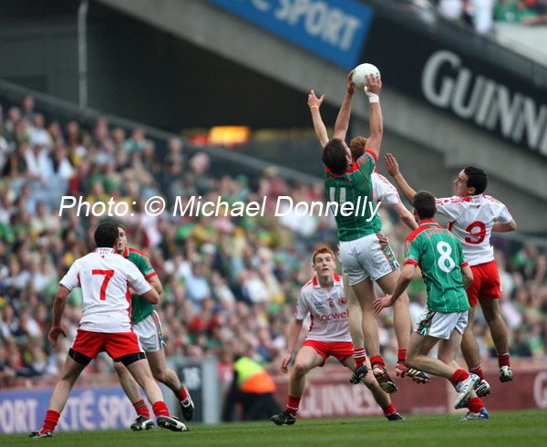 Aiden O'Shea goes high to collect for Mayo against Tyrone in the ESB GAA All Ireland Minor Football Final in Croke Park. Photo:  Michael Donnelly