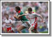 Tyrone's Gavin Teague tries to hold on to Mayo's Aiden O'Shea in the ESB GAA All Ireland Minor Football Final in Croke Park. Photo:  Michael Donnelly