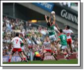Aiden O'Shea goes high to collect for Mayo against Tyrone in the ESB GAA All Ireland Minor Football Final in Croke Park. Photo:  Michael Donnelly