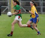 Marcella Herffernan  stays ahead  in the TG4 Senior Connacht Championship in Dr Hyde Park Roscommon. Photo Michael Donnelly.