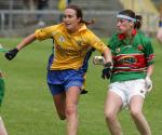 Roscommons Annette McGeeney and Mayo's Christina Heffernan keep close company in the TG4 Senior Connacht Championship in Dr Hyde Park Roscommon. Photo Michael Donnelly.