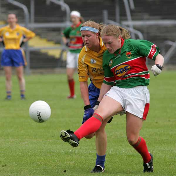 Claire Egan setting up another attack in the TG4 Senior Connacht Championship in Dr Hyde Park Roscommon. Photo Michael Donnelly.