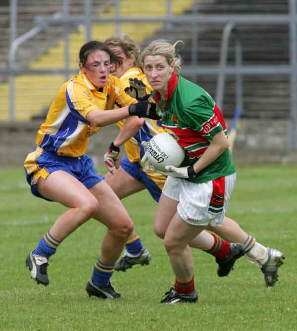 Cora Staunton takes evasive action in the TG4 Senior Connacht Championship in Dr Hyde Park Roscommon. Photo Michael Donnelly.