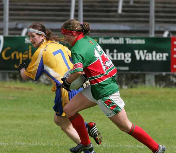 Fiona McHale (Mayo) getting by Ursula Brooks to set up another attack the TG4 Senior Connacht Championship in Dr Hyde Park Roscommon. Photo Michael Donnelly.