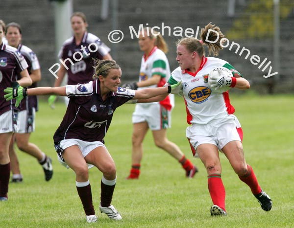 Claire Egan keeps the Galway Defence at arms length in the Connacht Ladies Football TG4 Senior Championship final in Tuam. Photo:  Michael Donnelly