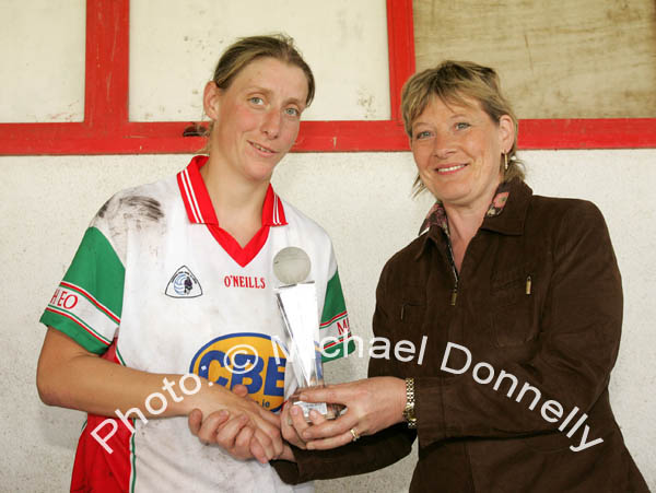 Cora Staunton is presented with the "Player of the Match" award by Mary Quinn, President Ladies GAA Connacht Council in the Connacht Ladies Football TG4 Senior Championship final in Tuam. Photo:  Michael Donnelly 