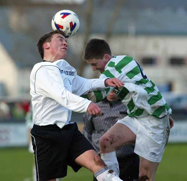 Peter Higgins Tramore and Niall O'Hara, Castlebar Celtic have an aerial duel in the SFAI U-17 
at Celtic Park Castlebar. Photo Michael Donnelly 