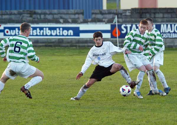 Sean Browne Tramore is outnumbered as he is surrounded by Castlebar Celtic players from left Rory Irwin, (6) Gerard O'Boyle and Paul Walsh  in the SFAI U-17 at  Celtic Park Castlebar.  Photo: Michael Donnelly

