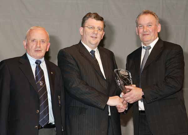 Pat Jennings TF Royal Hotel and Theatre (sponsor at the Connacht GAA Sportswriters Awards) presents the Connacht Sportswriters monthly award  for June to Val Heaney who accepted on behalf of his son David Heaney, at the Connacht GAA Sportswriters Presentation Dinner in the TF Royal Hotel and Theatre Castlebar, included in photo on left is Tommy Moran President GAA Connacht Council. Photo Michael Donnelly 

