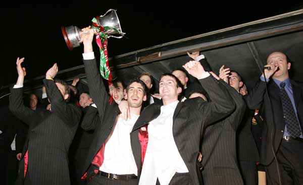 Brian Ruane, captain of the Ballina Stephenites team, displays the Cup to the crowd at the Homecoming celebrations in James Stephens Park, Ballina. Photo Michael Donnelly