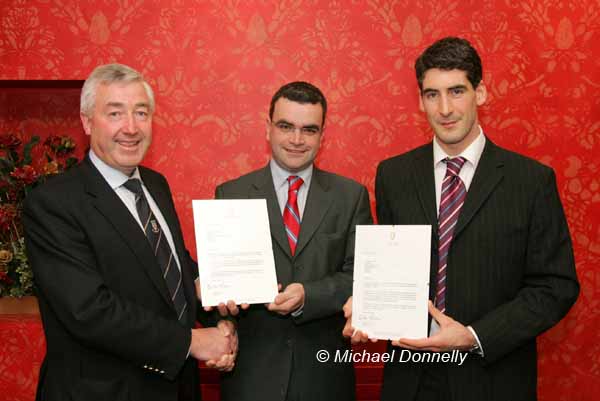 Darragh Calleary presenting (on behalf of An Taoiseach Mr Bertie Ahern) letters of Congratulations to Balllina Stephenites at their Victory Celebration Dinner in the Downhill House Hotel, Ballina included in photo from left: Padraic Prendergast, Club Chairman; Darragh Calleary and Brian Ruane team captain. Photo Micahel Donnelly