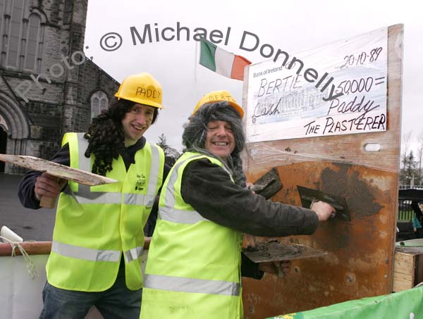Paddy the Plasterer doing  a job for Bertie at St Patrick's Day Parade in Claremorris. Photo:  Michael Donnelly