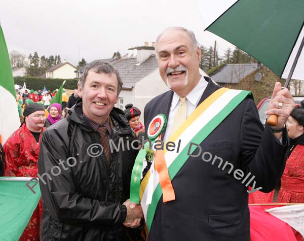 Jim Fogarty, Kiltimagh and Bob Shannon, leader of the Quaker City String Band at St Patrick's Day Parade in Kiltimagh. Photo:  Michael Donnelly