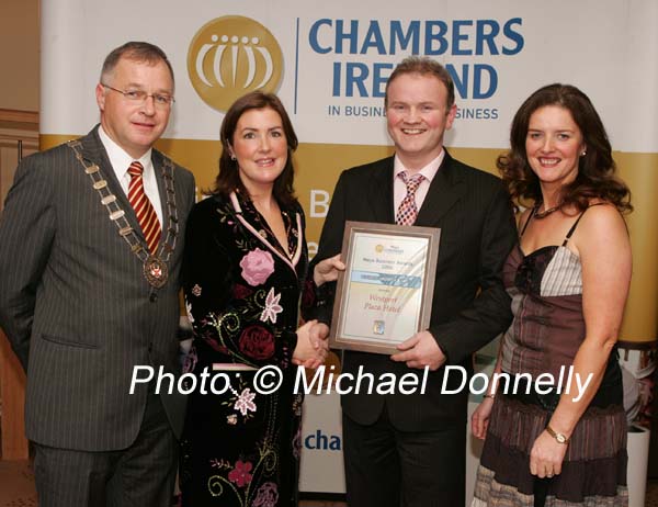 Ann Gallagher VHi Healthcare (sponsors) presents Joe and Anna Marie Corcoran of the Westport Plaza Hotel with the Best Growth Award, included in left is Owen Hughes, President Westport Chamber of Commerce. Photo:  Michael Donnelly