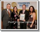 Ann Gallagher VHi Healthcare (sponsors) presents Joe and Anna Marie Corcoran of the Westport Plaza Hotel with the Best Growth Award, included in left is Owen Hughes, President Westport Chamber of Commerce. Photo:  Michael Donnelly