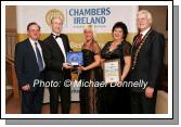 Conor Ganly, News Editor Mayo News (sponsors)  presents the Customer Service Award Service Sector to Amanda Torrens, and Evelyn Doyle-Douglas of Brookvale Manor Private Nursing Home, Ballyhaunis, included in photo on left is Patrick Smyth, Proprietor and on right Donal Shanaghy Ballyhaunis Chamber of Commerce. Photo:  Michael Donnelly