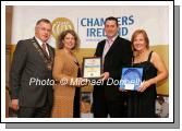 Lesley Emerson representing Ireland West (sponsors) presents the Mayo Pub of the Year award to Harry and Liz McManamon of the Graunne Uaile, Newport, on left is Owen Hughes, President Westport Chamber of Commerce. Photo:  Michael Donnelly 