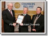 Frank Fullard CEO Mayo Enterprise Board presents Kevin MacNeely, of Castlebar Tailoring and Embroidery, winner of "Best new Business" with his award, included in photo is John Shaughnessy, Castlebar Chamber of Commerce. Photo:  Michael Donnelly