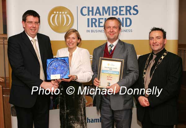 Seamus McCormack  WESTBIC (sponsors) presents the Best New Business Concept Award to Fania and Julian Ellison, of InTime Media; on right is John Shaughnessy, Castlebar Chamber of Commerce. Photo:  Michael Donnelly