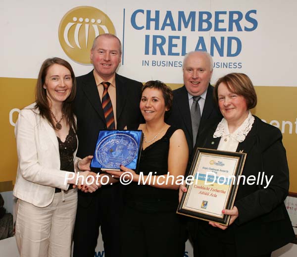 Pamela N Thaidhg, dars na Gaeltachta (sponsors) presents the Gaeltacht Business Award  2006 to Majella U Ghallachobair Comhlacht Forbartha Aitiil Acla and Maura A Mhic Lochlainn CFAA, at back are Toirleach  Duibhir and Toirleach  Duibhir
on right Owen Hughes, President Westport Chamber of Commerce. Photo:  Michael Donnelly