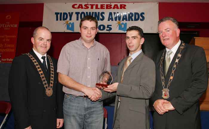 Colm Mulroy is presented with award for Best  Service Station (Mulroys Breaffy Rd) in the Castlebar Tidy Towns Competition at the presentation of prizes in the TF Royal Hotel and Theatre Castlebar, included in photo from left: Cllr Blackie Gavin Mayor of Castlebar, Colm Mulroy, Ronan  Ward, chairman Castlebar Tidy Towns Committee, and Pat Murray, President Castlebar Chamber of Commerce.  Photo: Michael Donnelly. 