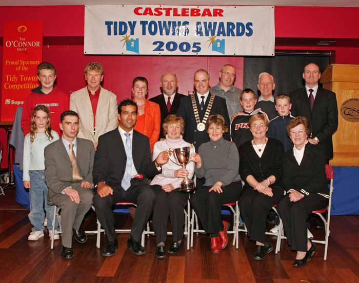 Tony Neutze, manager SuperValu Castlebar presents the Super Valu Perpetual Cup for Castlebar Tidy Towns  Housing Estates Overall winner  to Mary McDonagh and Bernie Douglas, Greenfields Estate, at the Castlebar Tidy Towns Competition awards presentation night in the TF Royal Hotel and Theatre Castlebar. Included in photo front from left: Grainne Gavin, Ronan Warde, Chairman Castlebar T.T.; Tony Neutze, Mary McDonagh, Bernie Douglas, Agnes Waldron, Bernie McDonnell; Back Row: John Tighe,Tony Tighe, Bernie Gavin, Cllr Michael Kilcoyne, Cllr Blackie Gavin, Cllr Eugene McCormack, Paul McDonagh, Cian Gavin, Padraig McDonnell, and Michael Mullahy.    Photo: Michael Donnelly.