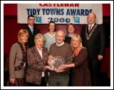 Shane Rodgers is presented with the Liam Durkan Recognition award at the Castlebar Tidy Towns Awards presentation night in the TF Royal Hotel Castlebar, front from left: Fiona Larkin, Eleanor Durkan, Shane Rodgers and Ann O'Loughlin, Castlebar Tidy Towns; At back  Ronan Warde, chairman Castlebar Tidy Towns; Louise Killeen Rodgers, Pauline Rodgers, and Mayor of Castlebar Cllr Brendan Henaghan. Photo:  Michael Donnelly 